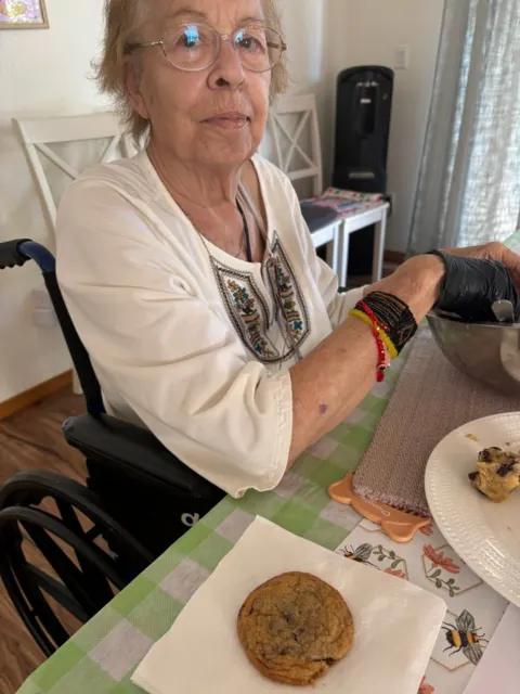 Resident enjoying a meal at the dining table at AAA Shepherd’s Care Home