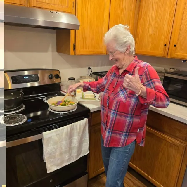 Resident helping prepare a meal at AAA Shepherd’s Care Home