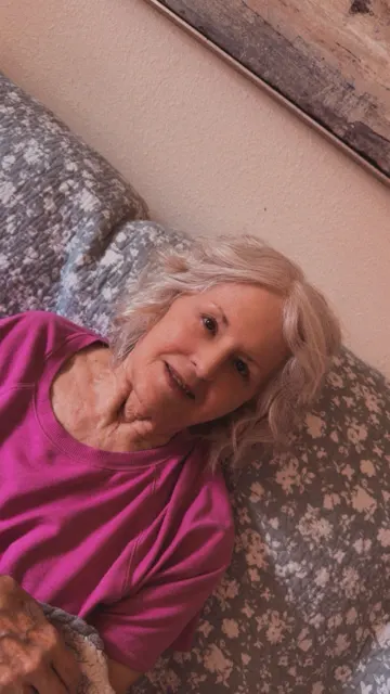 Resident resting comfortably with a blanket at AAA Shepherd’s Care Home