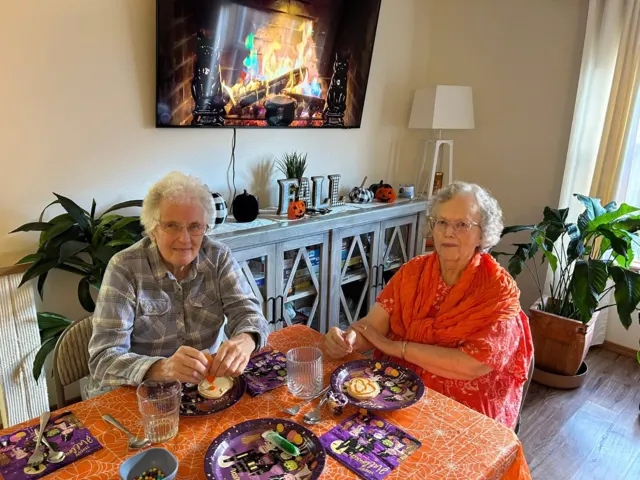 Residents enjoying seasonal treats together at AAA Shepherd’s Care Home